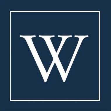 Woodmont Mews logo. The letter "W" in a box
